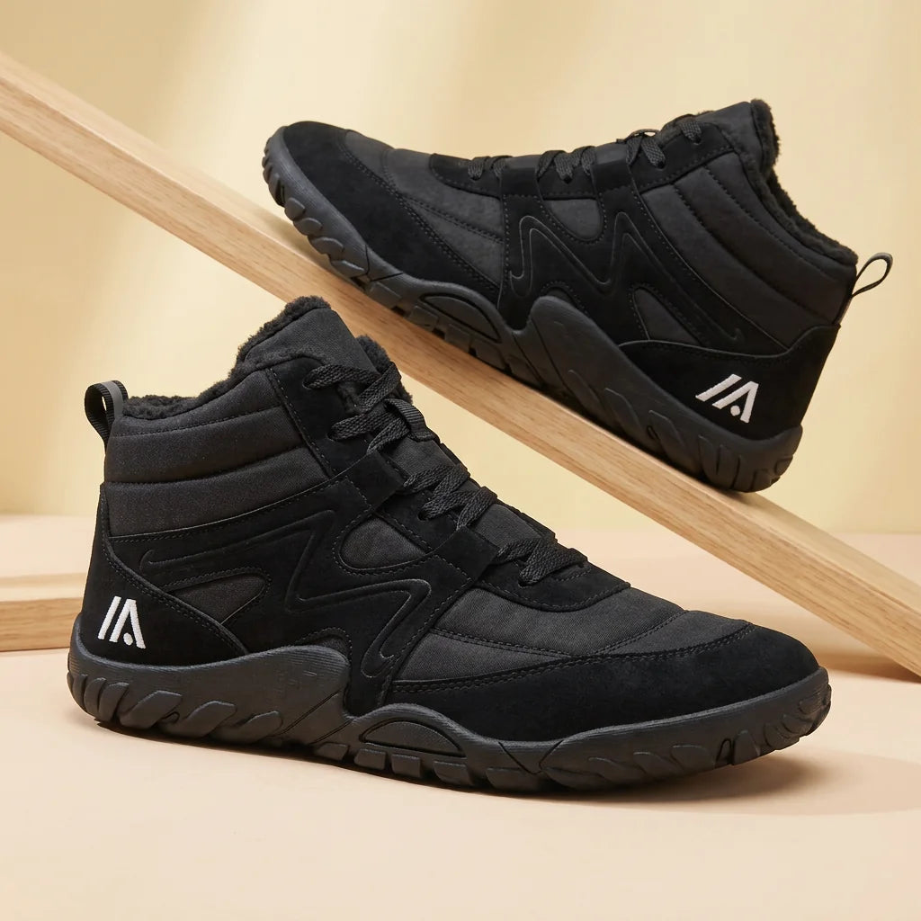 Alvidon AlbaStride Weiß – Barfußschuhe, Detailaufnahme des gestickten Alvidon-Logos, für Damen und Herren