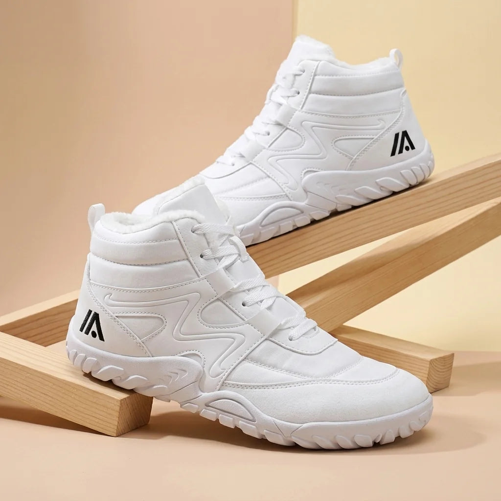 Alvidon AlbaStride Weiß – Barfußschuhe, Detailaufnahme des gestickten Alvidon-Logos, für Damen und Herren