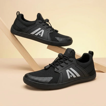 Alvidon BrezzaLite Weiß – Barfußschuhe, Detailaufnahme des gestickten Alvidon-Logos, für Damen und Herren