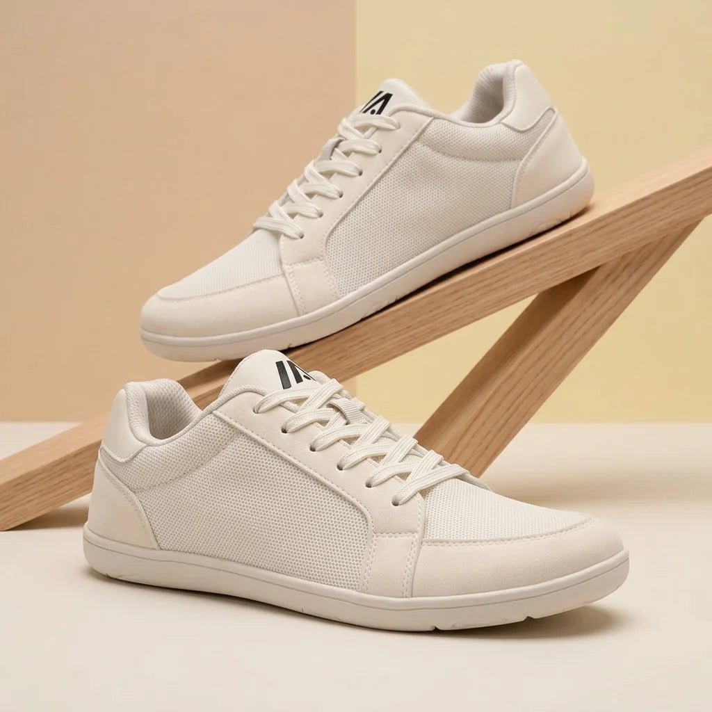 Alvidon FreiSchritt Beige – Barfußschuhe, Detailaufnahme des gestickten Alvidon-Logos, für Damen und Herren