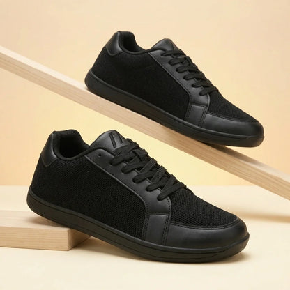 Alvidon FreiSchritt Beige – Barfußschuhe, Detailaufnahme des gestickten Alvidon-Logos, für Damen und Herren