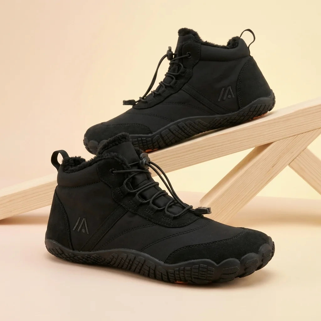 Alvidon FreiWeg Braun – Barfußschuhe, Detailaufnahme des gestickten Alvidon-Logos, für Damen und Herren