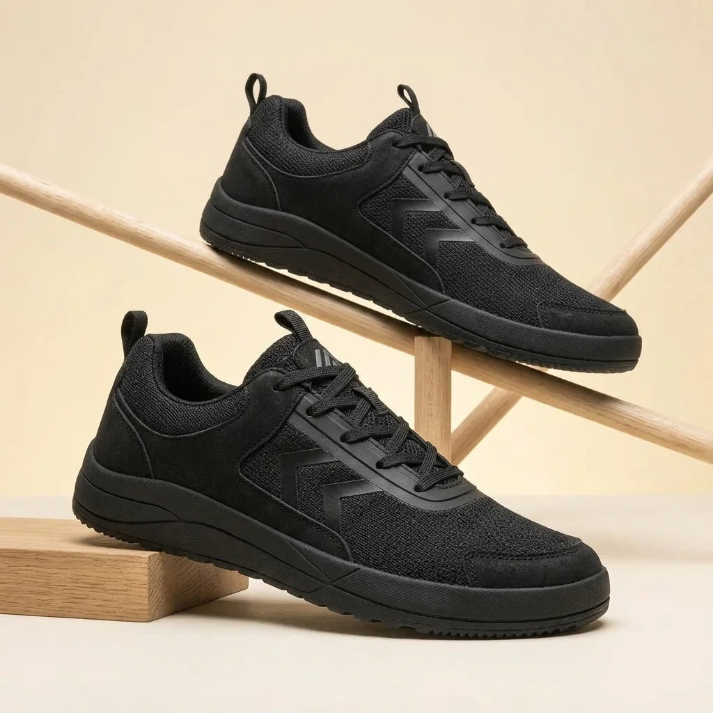Alvidon OlivaWalk Olivgrün – Barfußschuhe, Detailaufnahme des gestickten Alvidon-Logos, für Damen und Herren