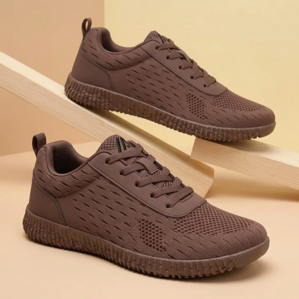 Alvidon PureStride Braun – Barfußschuhe, Detailaufnahme des gestickten Alvidon-Logos, für Damen und Herren