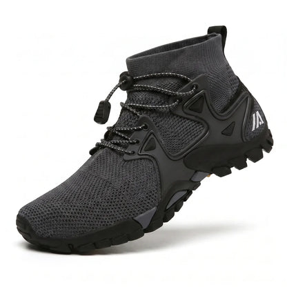 Alvidon RockStep Schwarz – Trail- und Wanderschuhe, Seitenansicht mit gesticktem Alvidon-Logo, Barfußschuhe für Damen und Herren