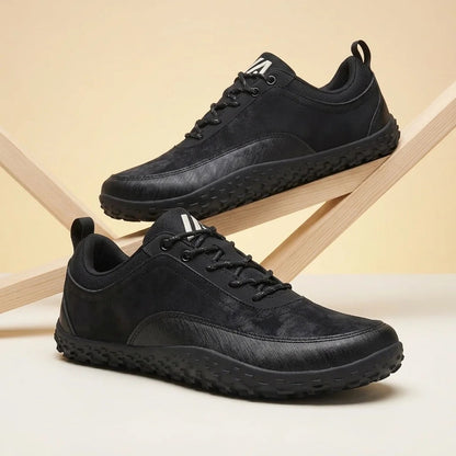 Alvidon TerraCuoio Grün – Barfußschuhe, Detailaufnahme des gestickten Alvidon-Logos, für Damen und Herren