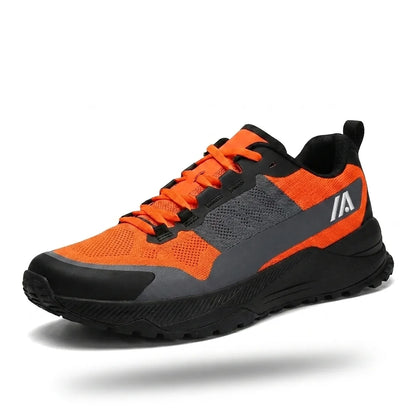 Alvidon TrailBolt Orange – leichte Laufschuhe, Seitenansicht mit gesticktem Alvidon-Logo, Barfußschuhe für Damen und Herren
