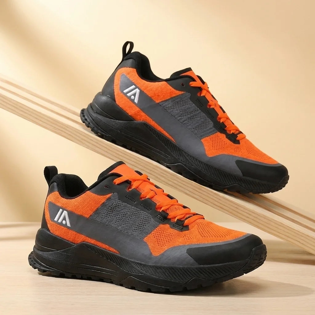 Alvidon TrailBolt Orange – leichte Laufschuhe, auf Asphalt im Morgenlicht, Barfußschuhe für Damen und Herren