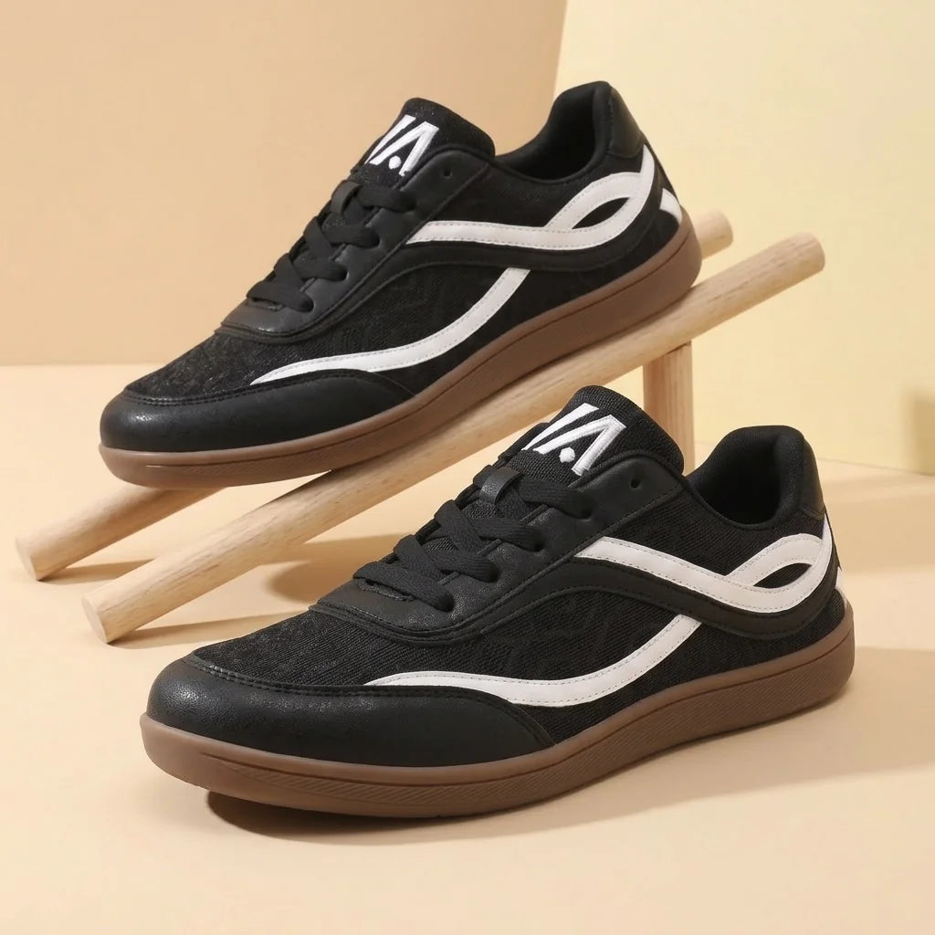 Alvidon VentoFlex Schwarz – Barfußschuhe, Detailaufnahme des gestickten Alvidon-Logos, für Damen und Herren