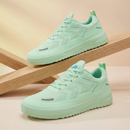 Alvidon VitaStep Weiß – Barfußschuhe, Detailaufnahme des gestickten Alvidon-Logos, für Damen und Herren