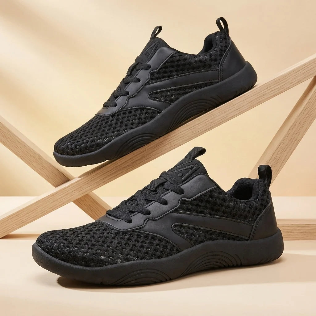 Alvidon WolkenSchritt Beige – Barfußschuhe, Detailaufnahme des gestickten Alvidon-Logos, für Damen und Herren