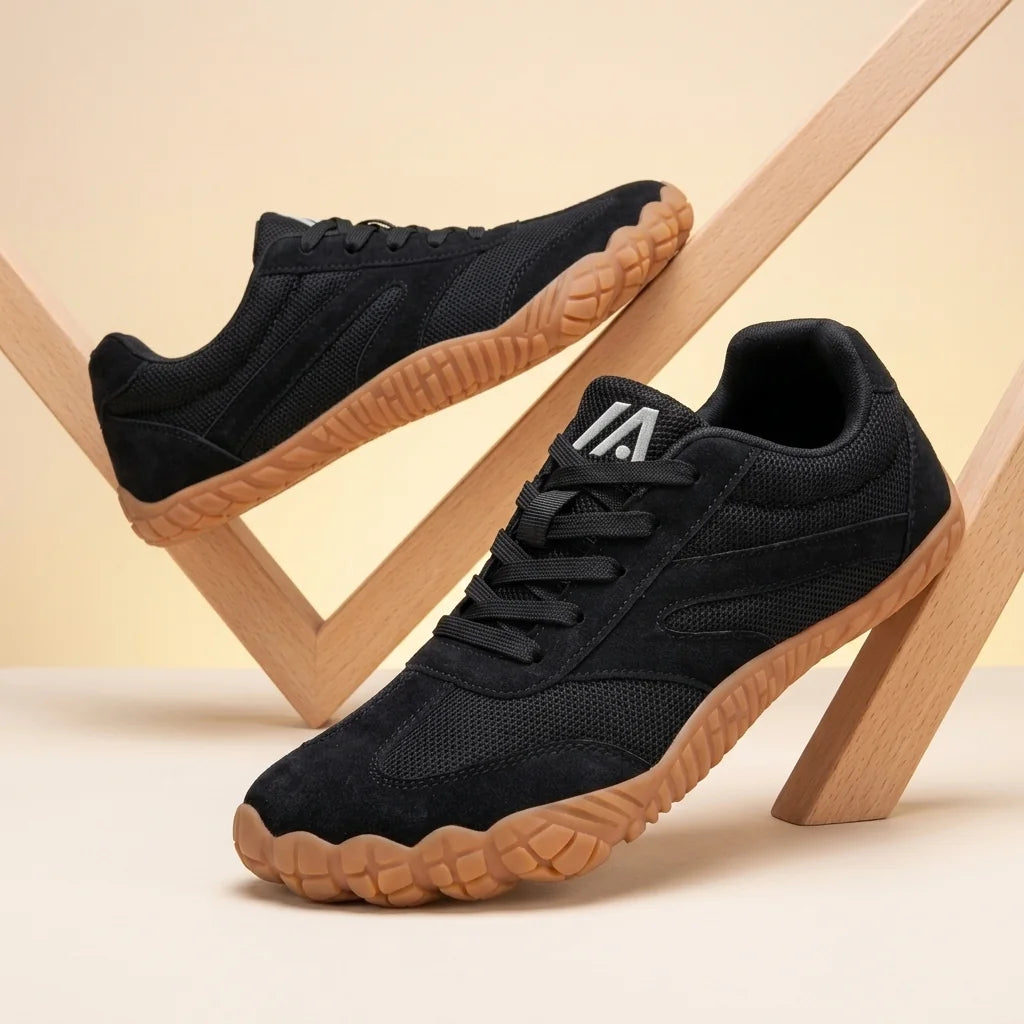 Alvidon ZenStride Dunkelgrau – Barfußschuhe, Detailaufnahme des gestickten Alvidon-Logos, für Damen und Herren